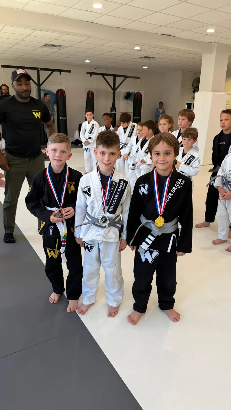 Kids ages 7 to 9 with their medals after the Wander Braga in-house tournament