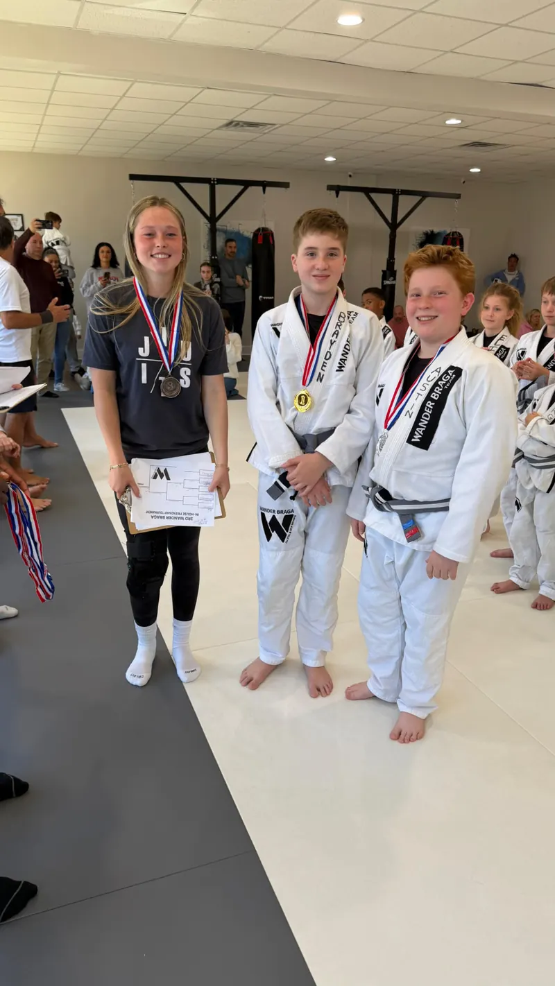Wander Braga kids on the podium with medals after the in-house tournament